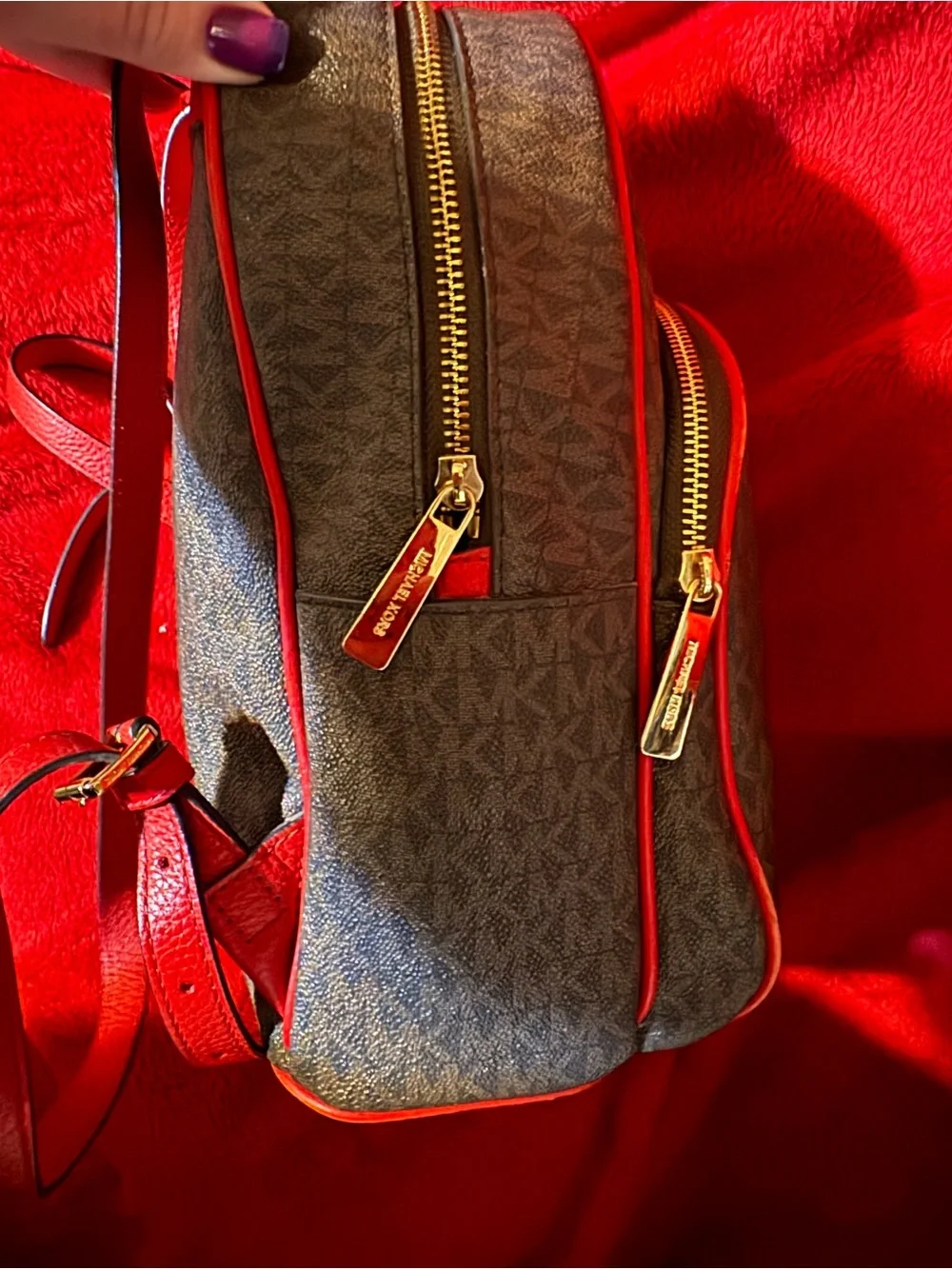 Michael Kors Brown Monogram Backpack with Red Trim and Gold Logo